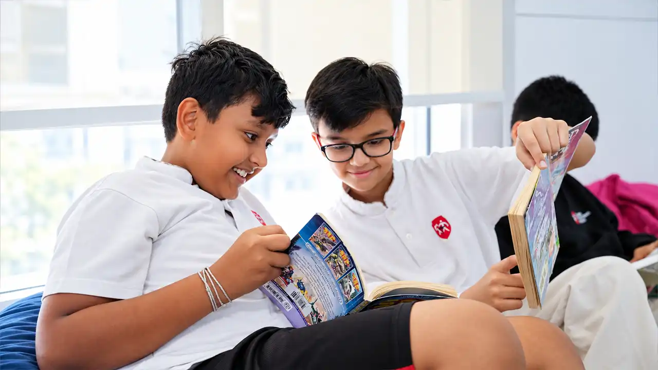 British curriculum stages: secondary students reading together in class